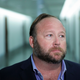 WASHINGTON, DC - SEPTEMBER 5: Alex Jones of InfoWars talks to reporters outside a Senate Intelligence Committee hearing concerning foreign influence operations’ use of social media platforms, on Capitol Hill, September 5, 2018 in Washington, DC. Twitter CEO Jack Dorsey and Facebook chief operating officer Sheryl Sandberg faced questions about how foreign operatives use their platforms in attempts to influence and manipulate public opinion.